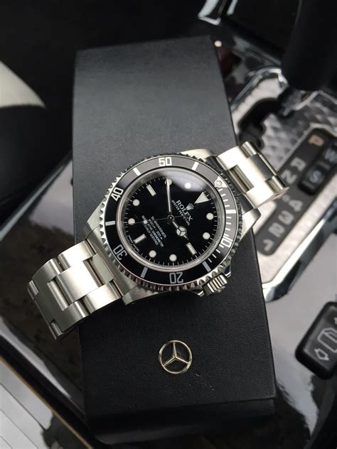 mercedes symbol on rolex watch.